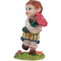 Bimbo con fiore in resina | Graziano Sas